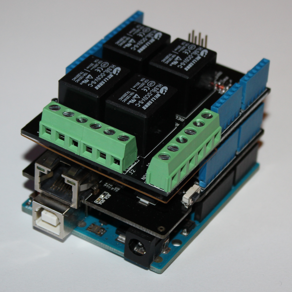 An Arduino Uno, an Ethernet Shield, and a Relay Shield